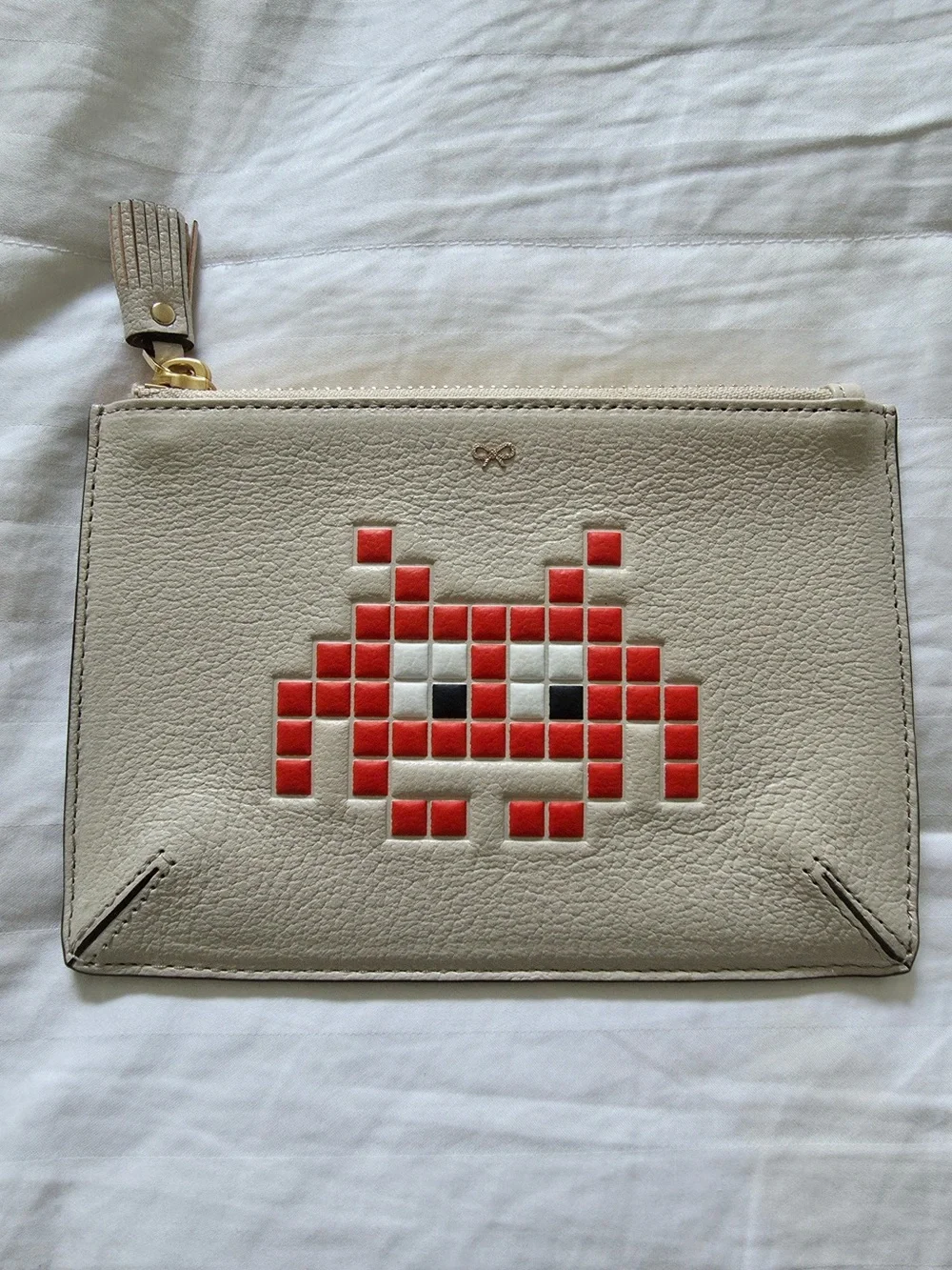 Anya Hindmarch Cream Leather Wristlet Clutch with Red Pixel Alien Motif